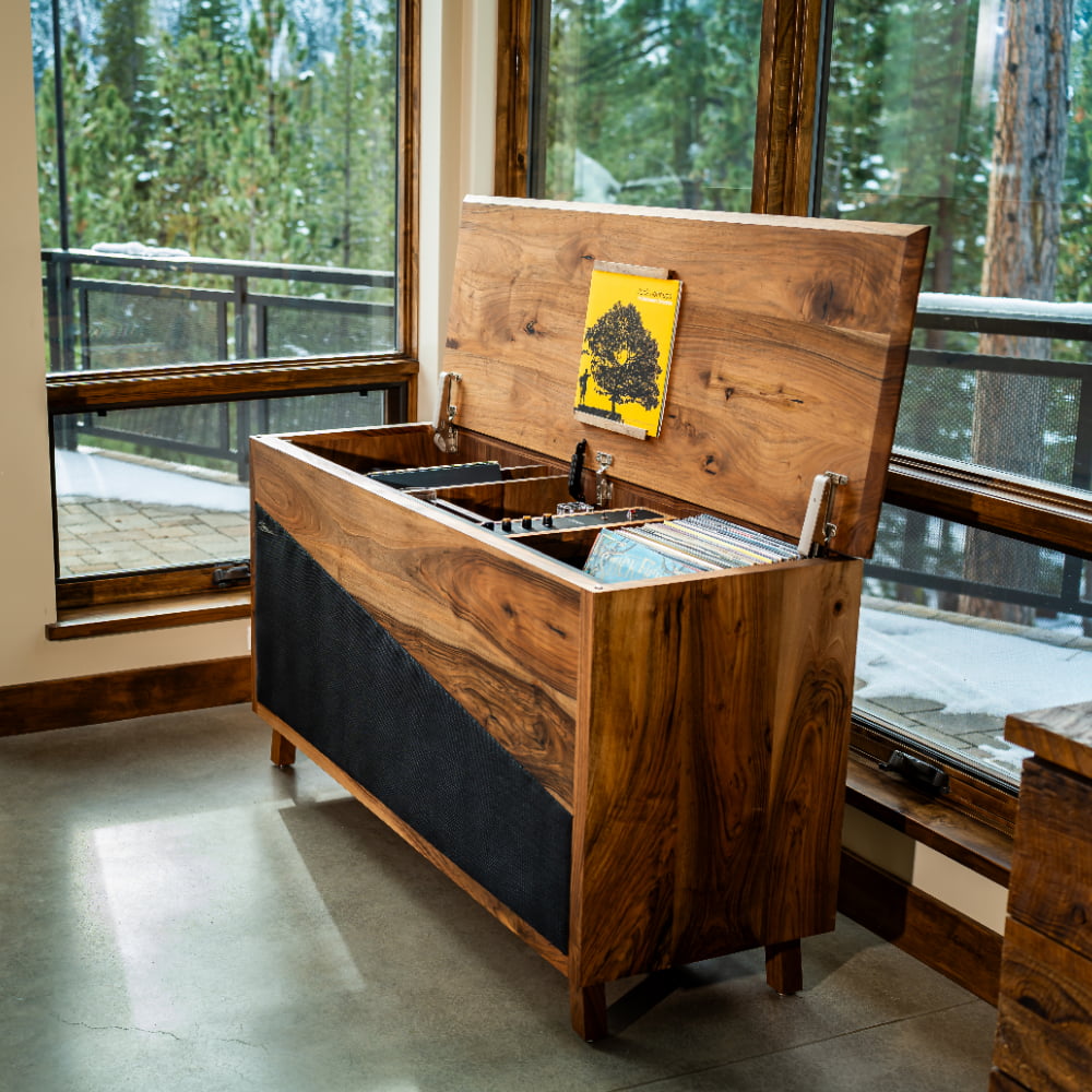 Streamline HiFi Mojo Console in beautiful living room with a mountain forested view.