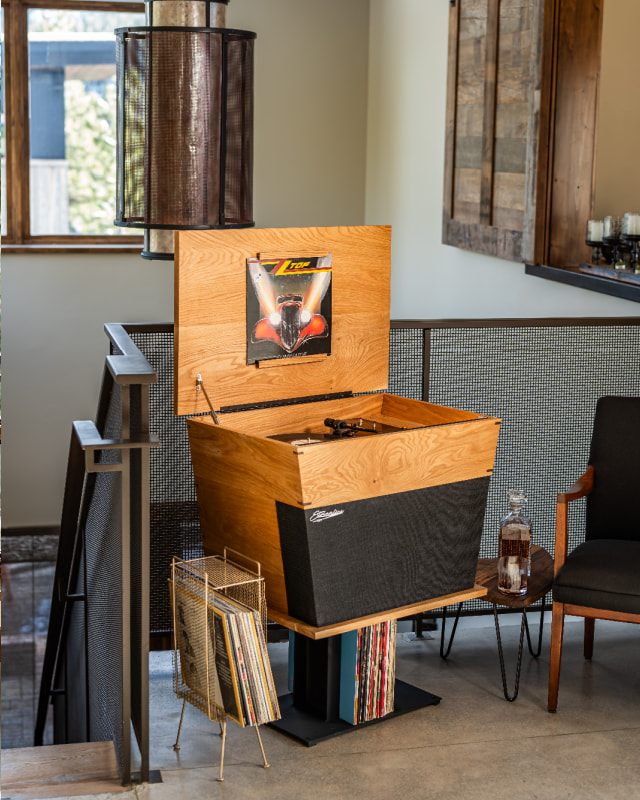 Streamline HiFi Crossroads model - centerpiece of listening area at the top of a staircase.