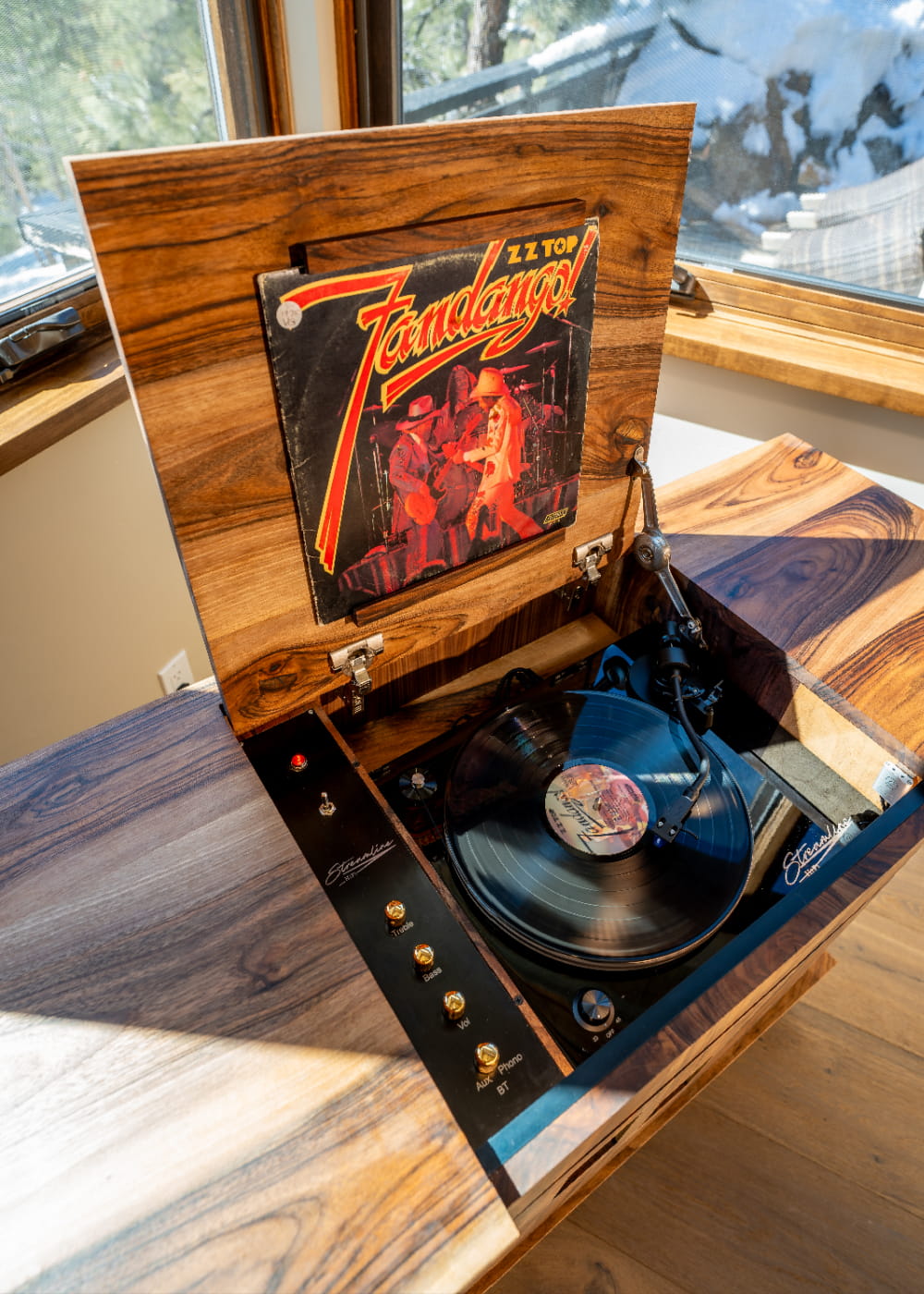 A view looking down at the Rambler console with top open and ZZ-Top record spinning.