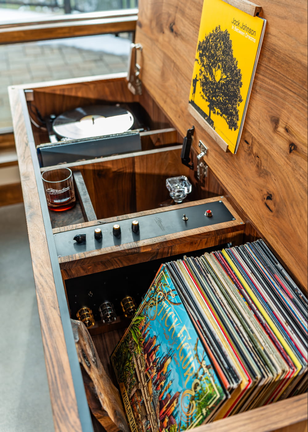 A view of the Mojo console in White Oak from above, with record spinning and the record collection in sight.